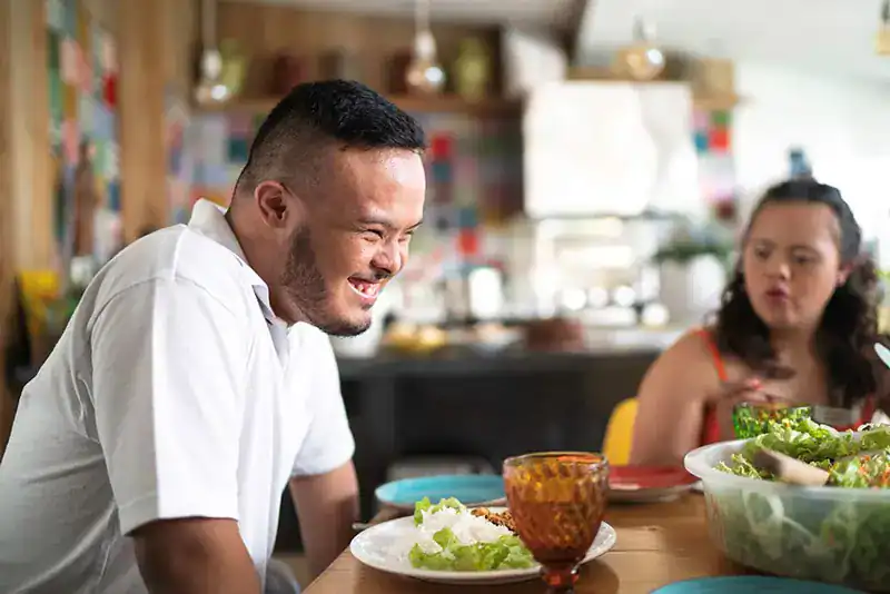Empowering Weight Loss: A Comprehensive Guide for Individuals with Disabilities 2 Image of a disabled man and balance around nutrition to aid weight loss Hastings