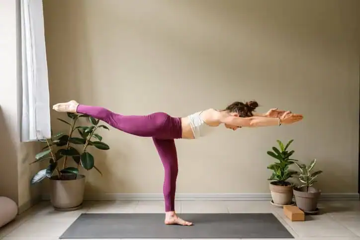 Achieving the Perfect Tone: How Often Should You Exercise for Results? 1 Woman doing Yoga exercise Hastings to help with toning the body.