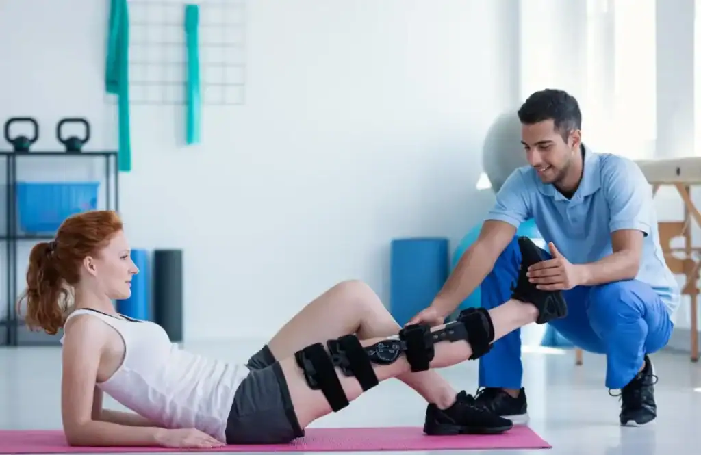 Debunking Meal Timing Myths: The Truth About Muscle Recovery 1 Woman having treatment to help muscle recovery Hastings after an injury